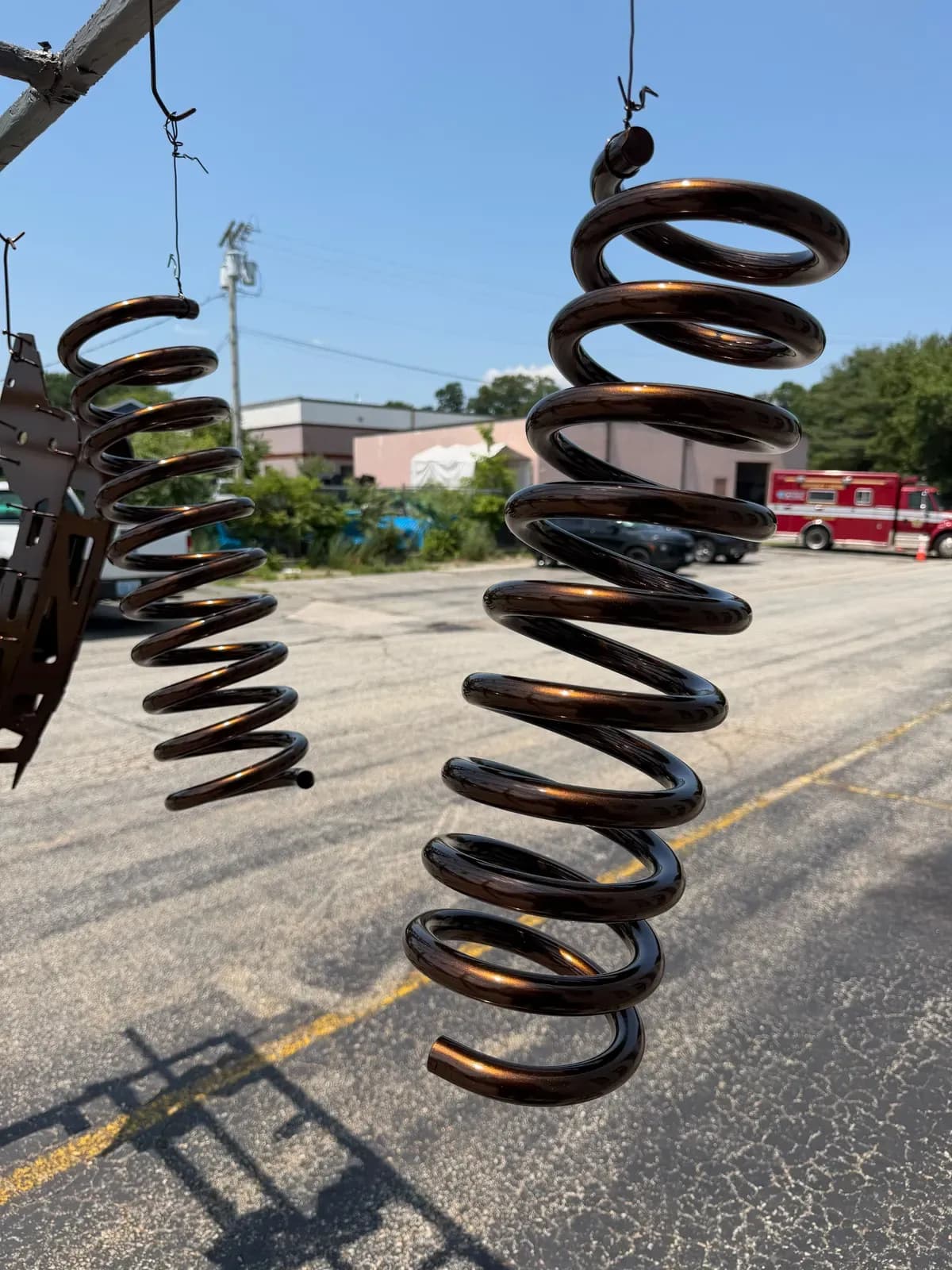 Pair of bronze powder coated coil springs